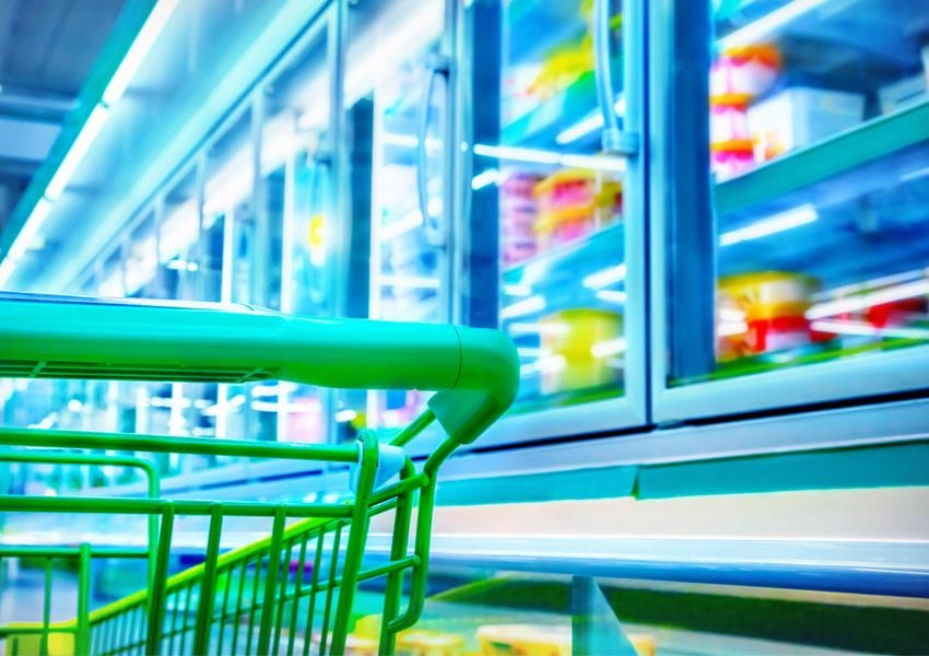 shopping cart in front of the refrigerator